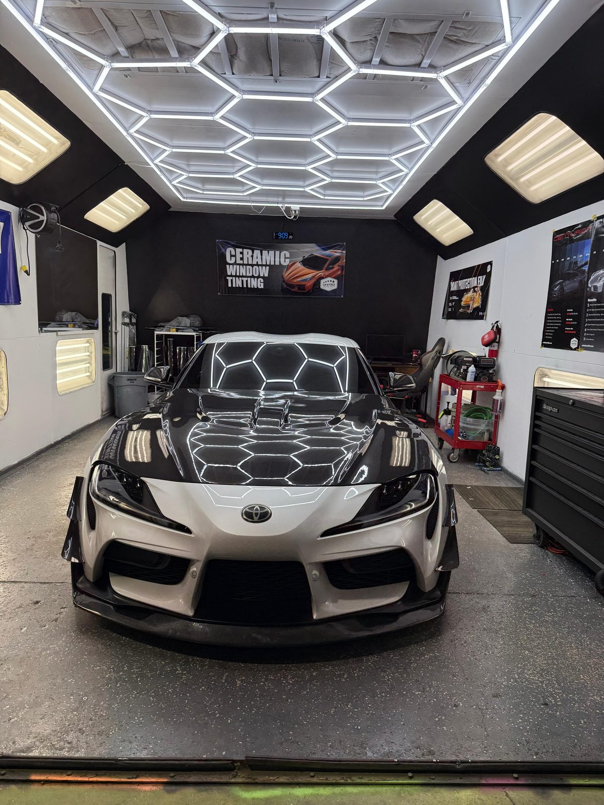 Toyota Supra with hexagon window tint pattern