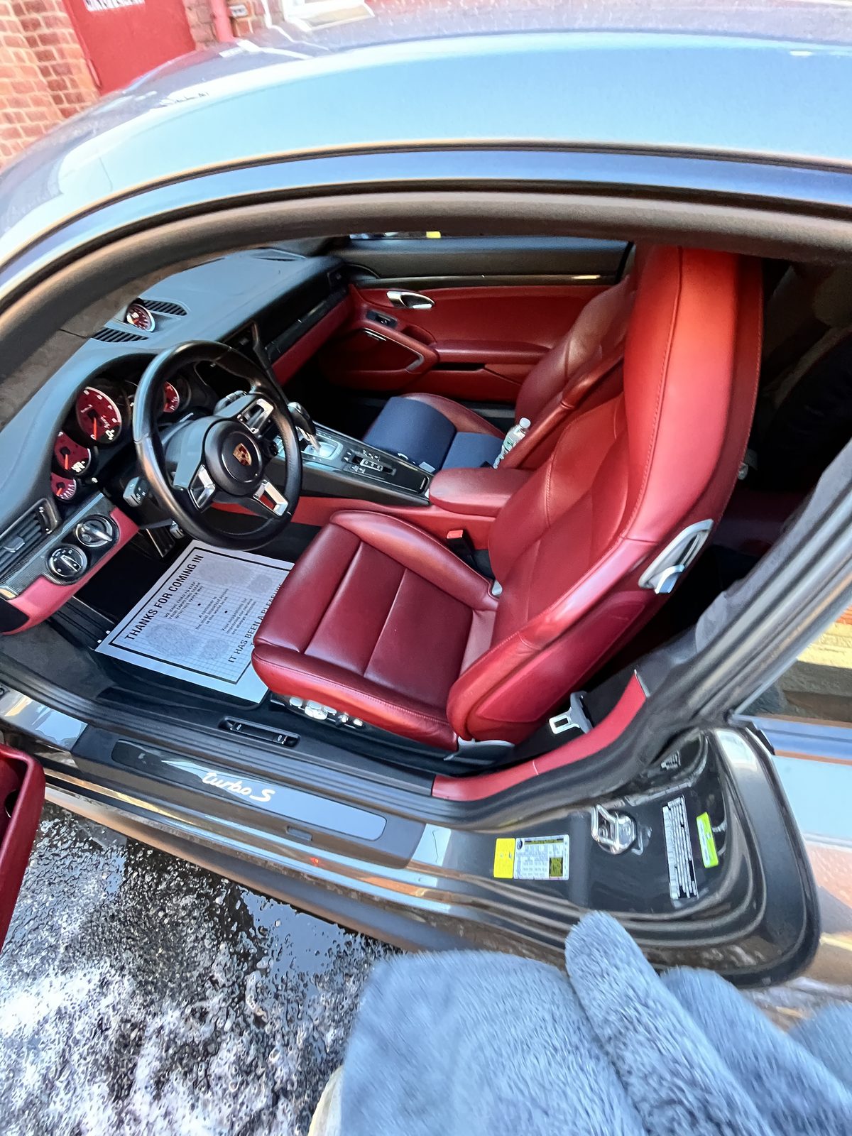 Porsche 911 Turbo S red leather interior detail