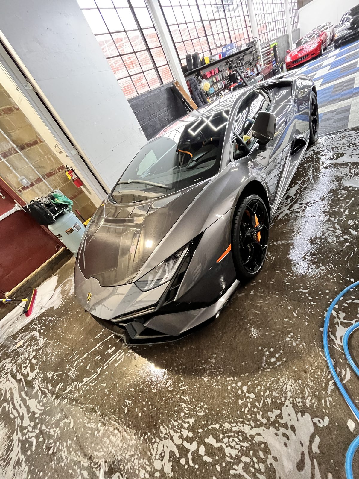 Grey Lamborghini Huracan in the shop
