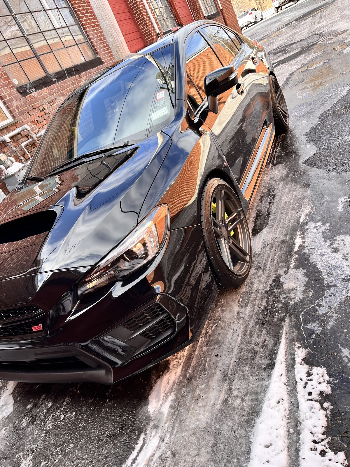 Exotic coupe with color-shift bronze wrap